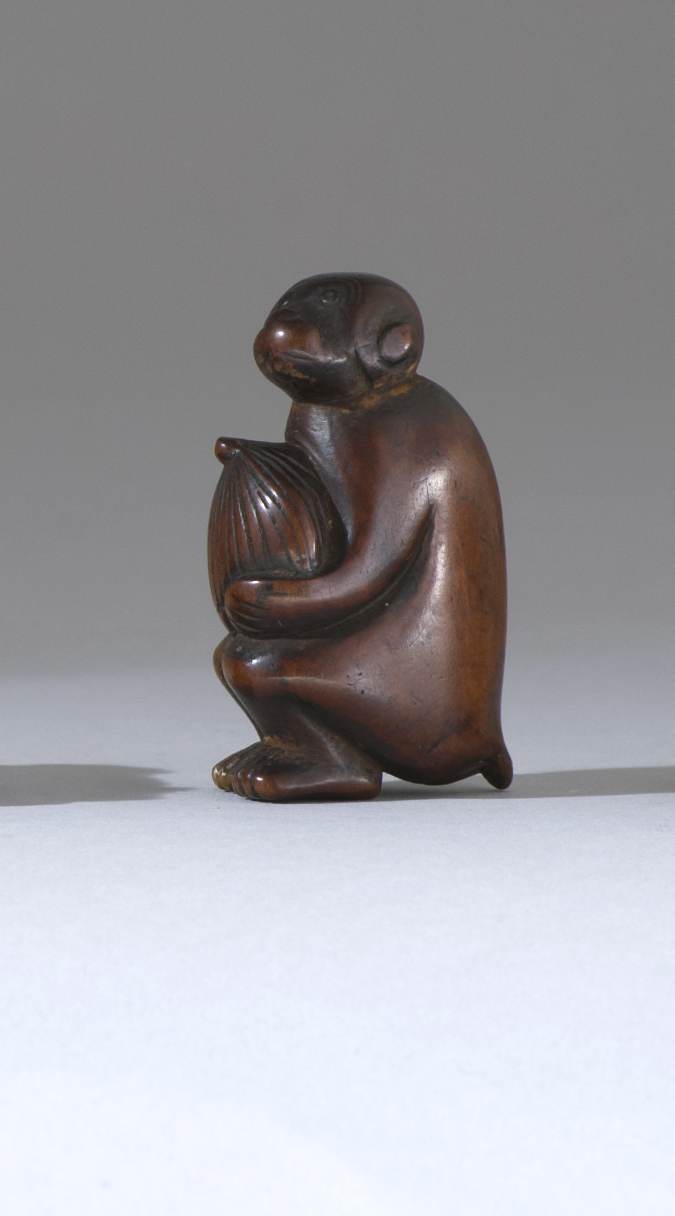 Appraisal: WOOD NETSUKE th th CenturyIn the form of a comic