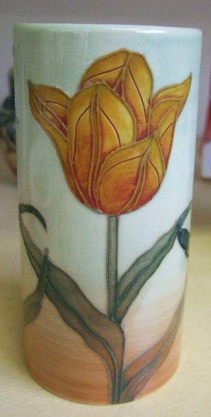 Appraisal: A Dennis china work sleeve vase decorated with tulips cm