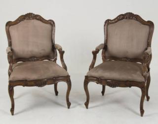 Appraisal: PAIR OF ITALIAN STYLE CARVED WOOD ARM CHAIRS COVERED IN