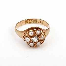 Appraisal: A vintage ct gold diamond and seed pearl cluster ring