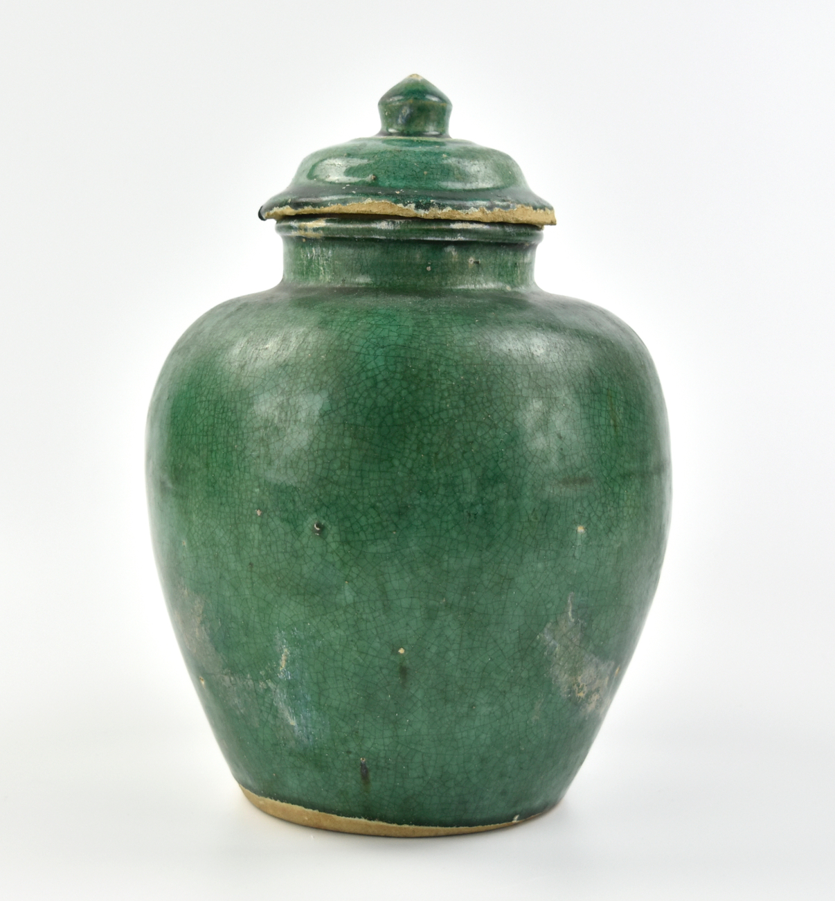 Appraisal: Chinese Qing Dynasty green glazed jar the rounded body rising