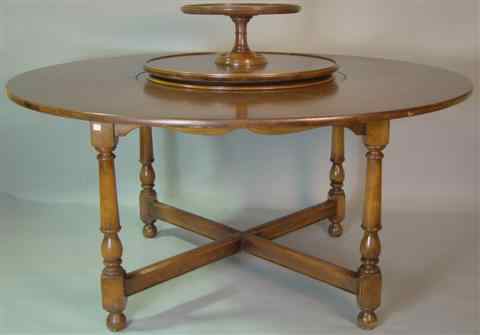 Appraisal: COLONIAL STYLE MAHOGANY CIRCULAR DINING TABLE WITH LAZY SUSAN the