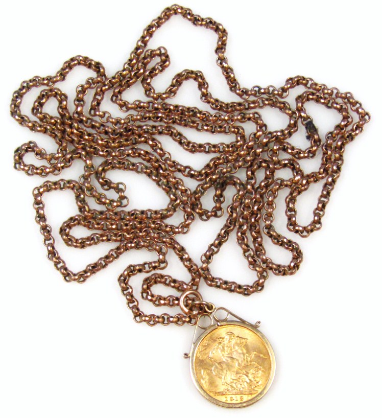 Appraisal: A long guard chain with plain links yellow metal marked