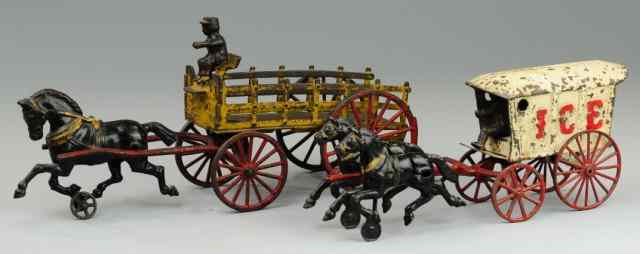 Appraisal: TWO HORSE DRAWN WAGONS Both cast iron includes Ice wagon