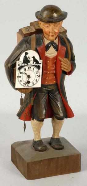 Appraisal: Hand Carved German Whistler Clock Description Working Depicting a man