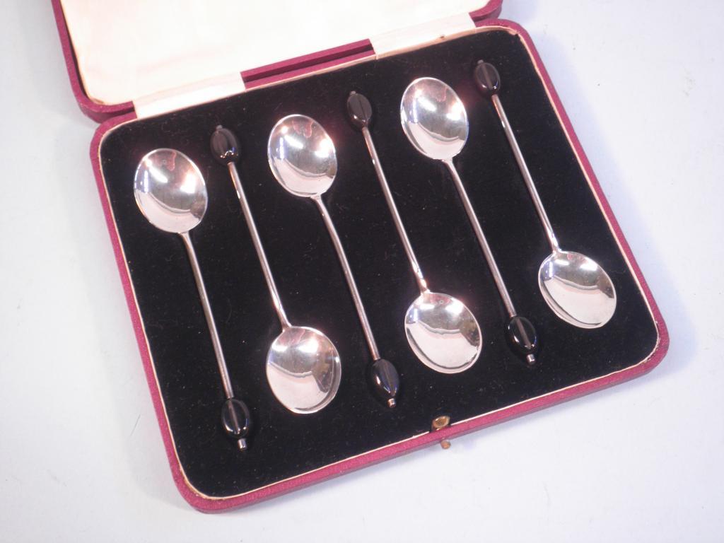 Appraisal: A set of Sheffield hallmark silver berry coffee spoons cased