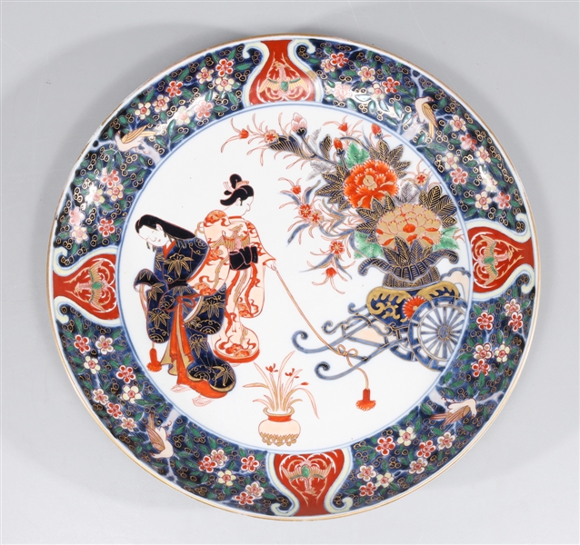 Appraisal: Chinese Imari style charger with floral decorative border featuring rising