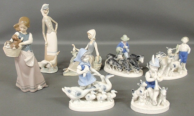 Appraisal: - Three Lladro figures tallest h and four German Erphila