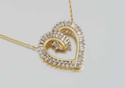 Appraisal: A Ladies' Diamond Heart Pendant k yellow gold open heart