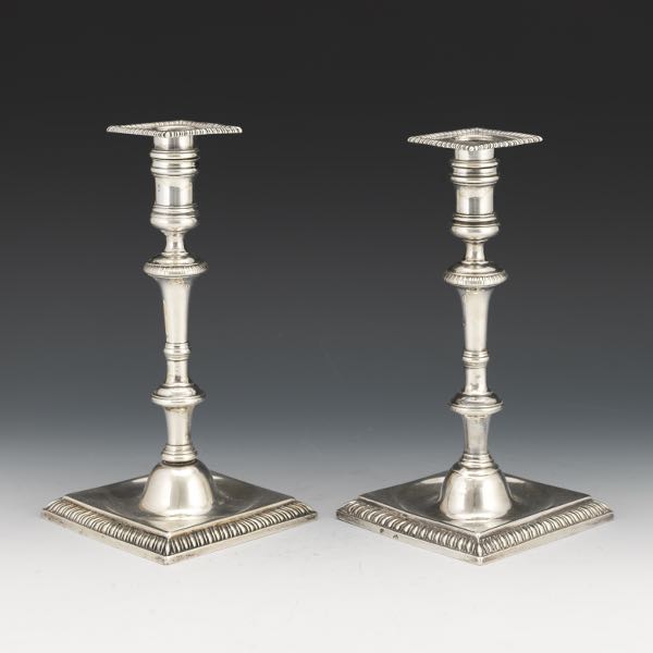 Appraisal: IRISH STERLING SILVER PAIR OF GEORGIAN CANDLESTICKS DUBLIN BARONIAL CREST