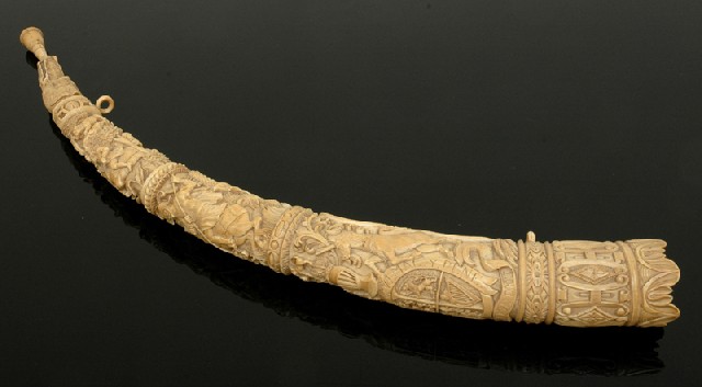 Appraisal: A RARE ORNATELY CARVED IVORY TUSK HUNTING HORN In the