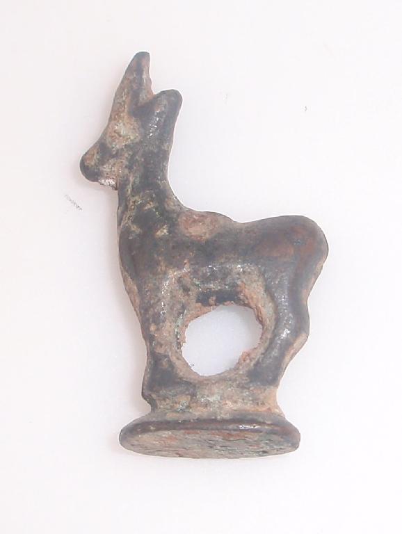 Appraisal: A small Luristan bronze figurine or weight in the form