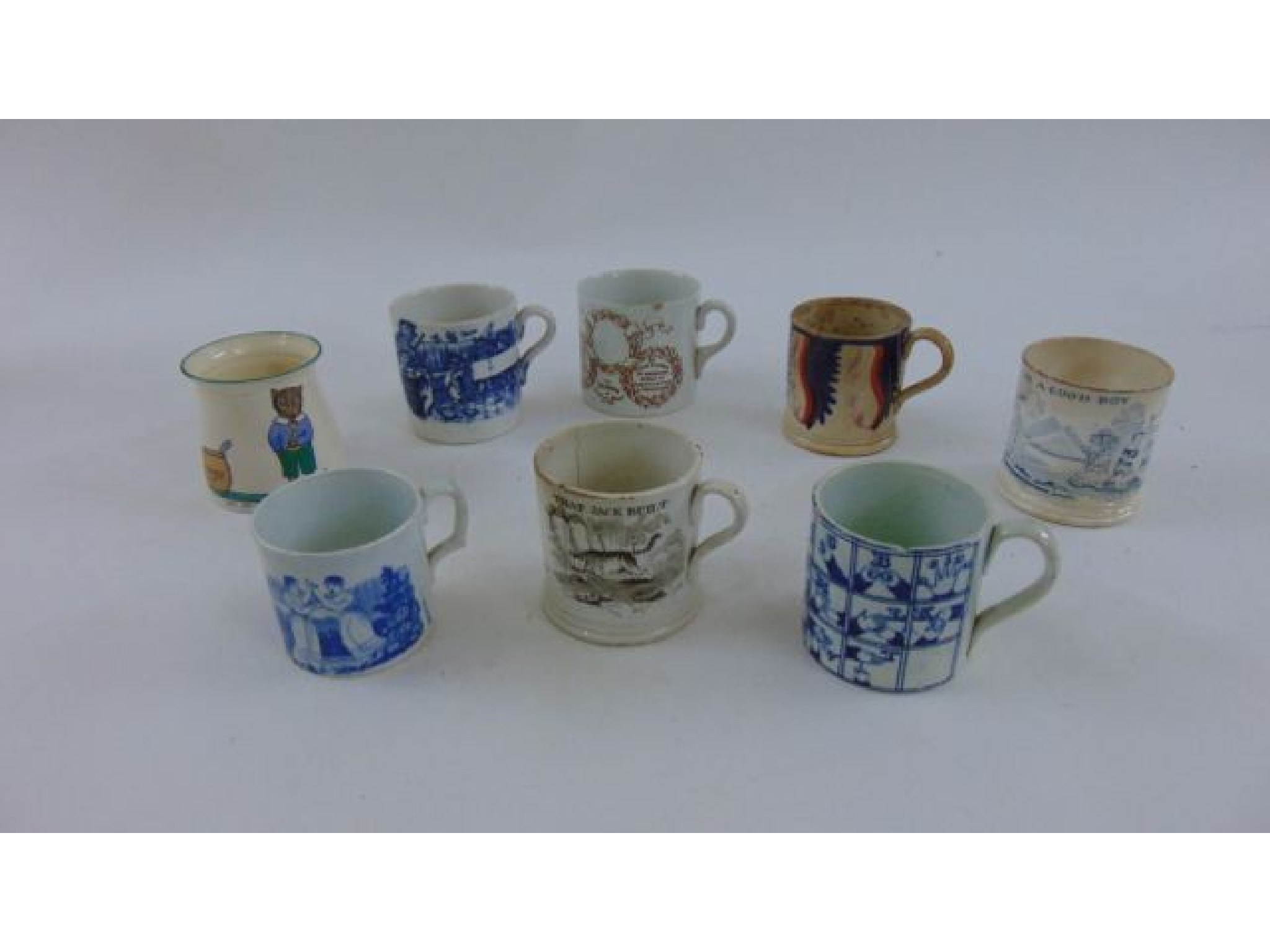 Appraisal: A collection of eight th century and later mugs including