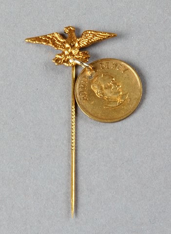 Appraisal: Stick pin Brass with an image of a brass eagle