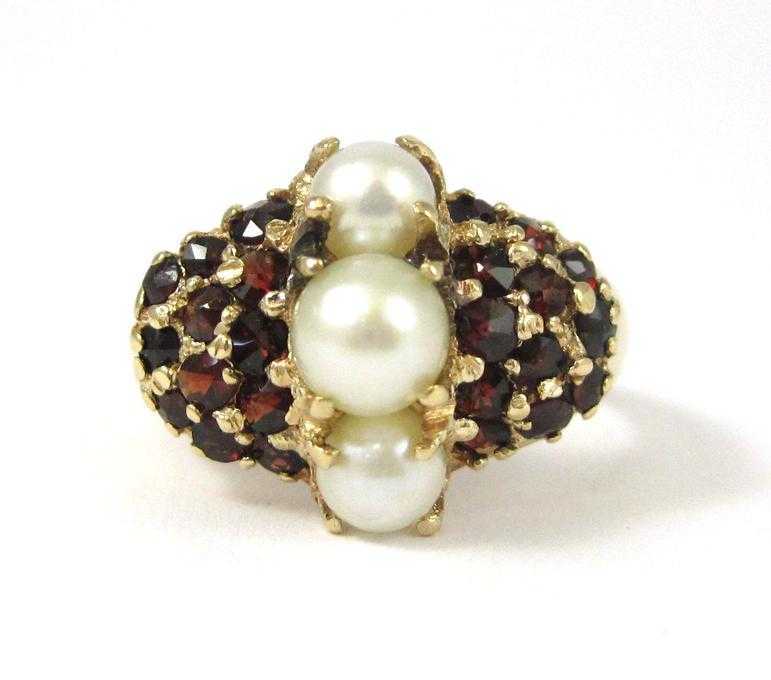 Appraisal: PEARL GARNET AND FOURTEEN KARAT GOLD RING with twelve round-cut