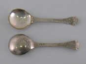 Appraisal: A pair of Danish silver Trefid marriage spoons with engraved