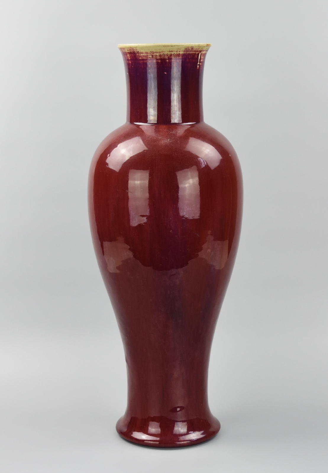 Appraisal: TALL CHINESE RED FLAMBE GLAZED VASE TH C A th