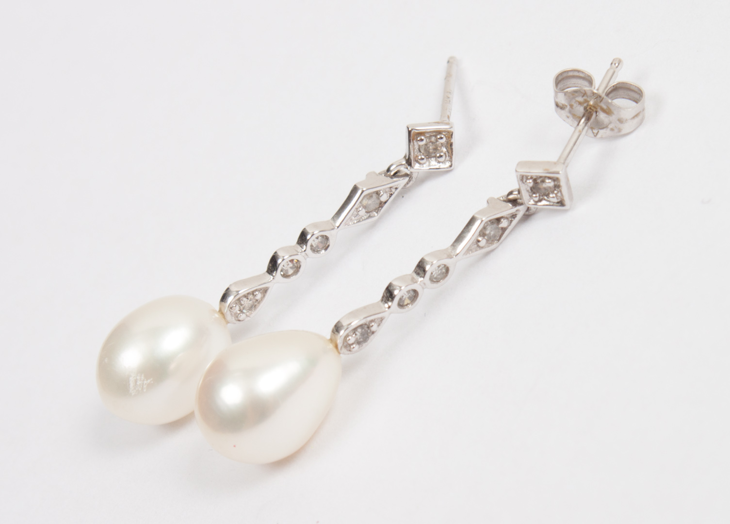 Appraisal: Lady's K gold diamond and pearl drop earrings about in