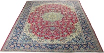 Appraisal: An Isfahan Carpet Large area carpet designed with an elaborate