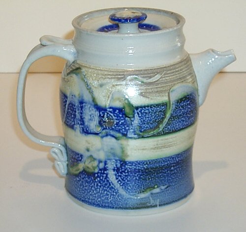 Appraisal: Coffee pot with lid glazed Vase Ceramic on Ceramic Ceramic