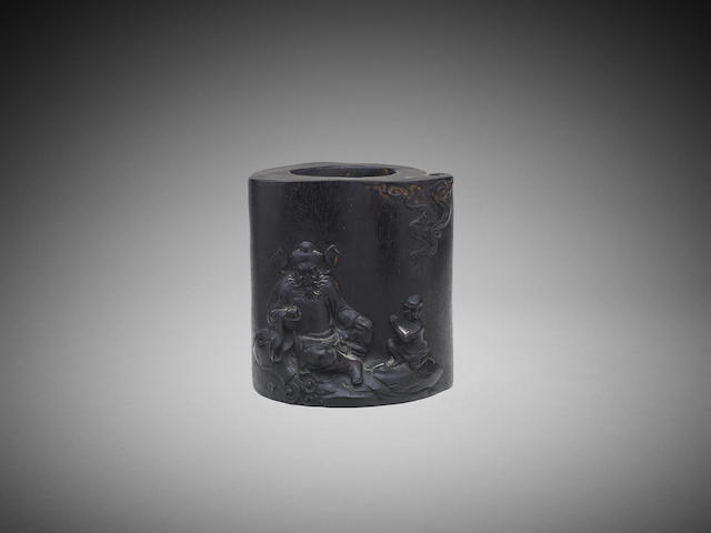 Appraisal: A Chinese carved 'Zhong Kui' hardwood brush pot cm high