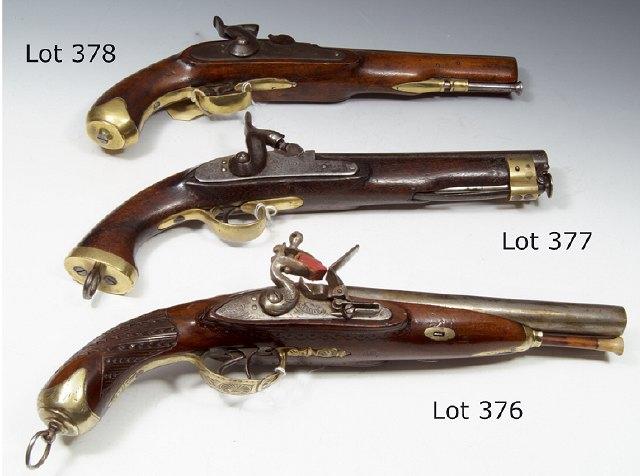 Appraisal: A SIDE BY SIDE DOUBLE BARRELLED FLINTLOCK PISTOL with twin