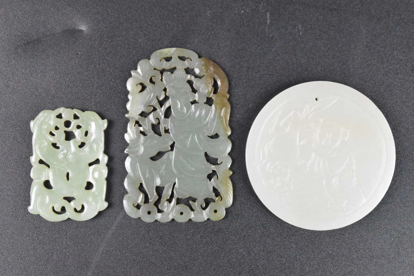 Appraisal: Three Chinese jade plaques of different sizes The smallest is