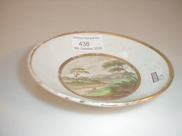 Appraisal: A Pinxton porcelain saucer the well painted with figures in