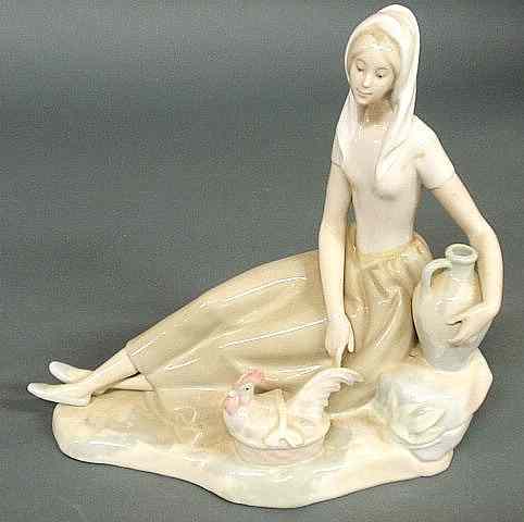 Appraisal: Lladro type figure of a seated woman with water jug