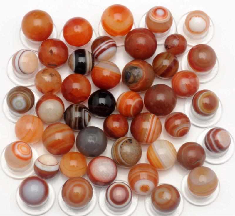 Appraisal: Lot of Hand-Made Agate Marbles Includes all hand-faceted Agate marbles