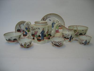 Appraisal: A STAFFORDSHIRE PORCELAIN PART TEASET c painted with chinoiserie figure