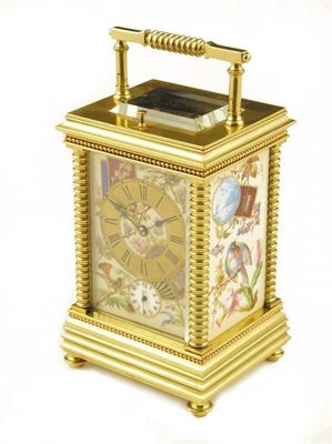 Appraisal: A French gilt brass and porcelain mounted carriage clock with