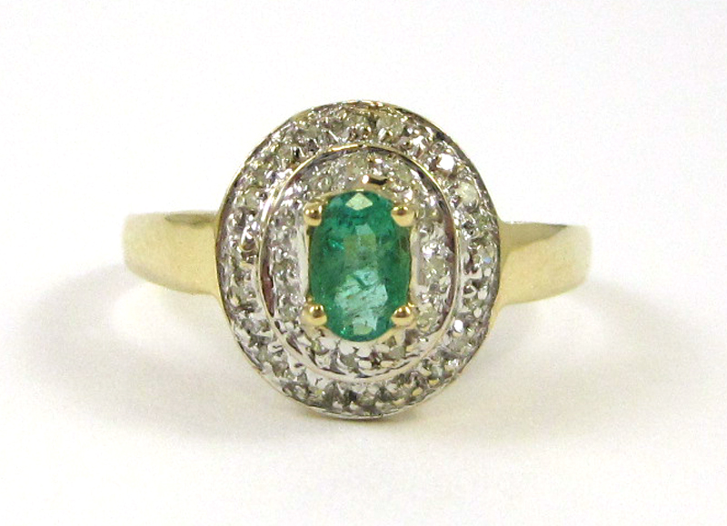 Appraisal: EMERALD DIAMOND AND FOURTEEN KARAT GOLD RING with round-cut diamonds