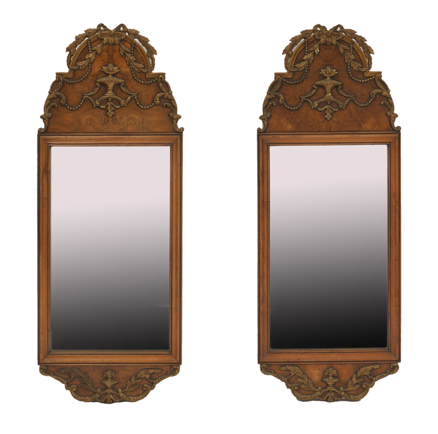 Appraisal: PAIR OF CARVED WALL MIRRORS Matched pair crest with carved