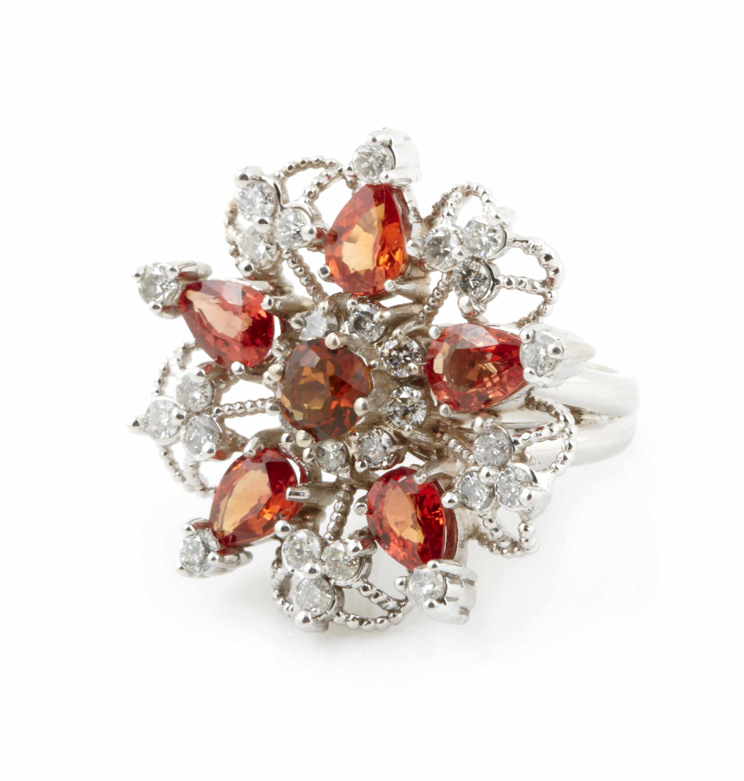 Appraisal: A topaz orange stone diamond and k white gold ring