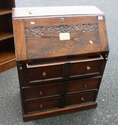 Appraisal: Carved oak bureau with keys