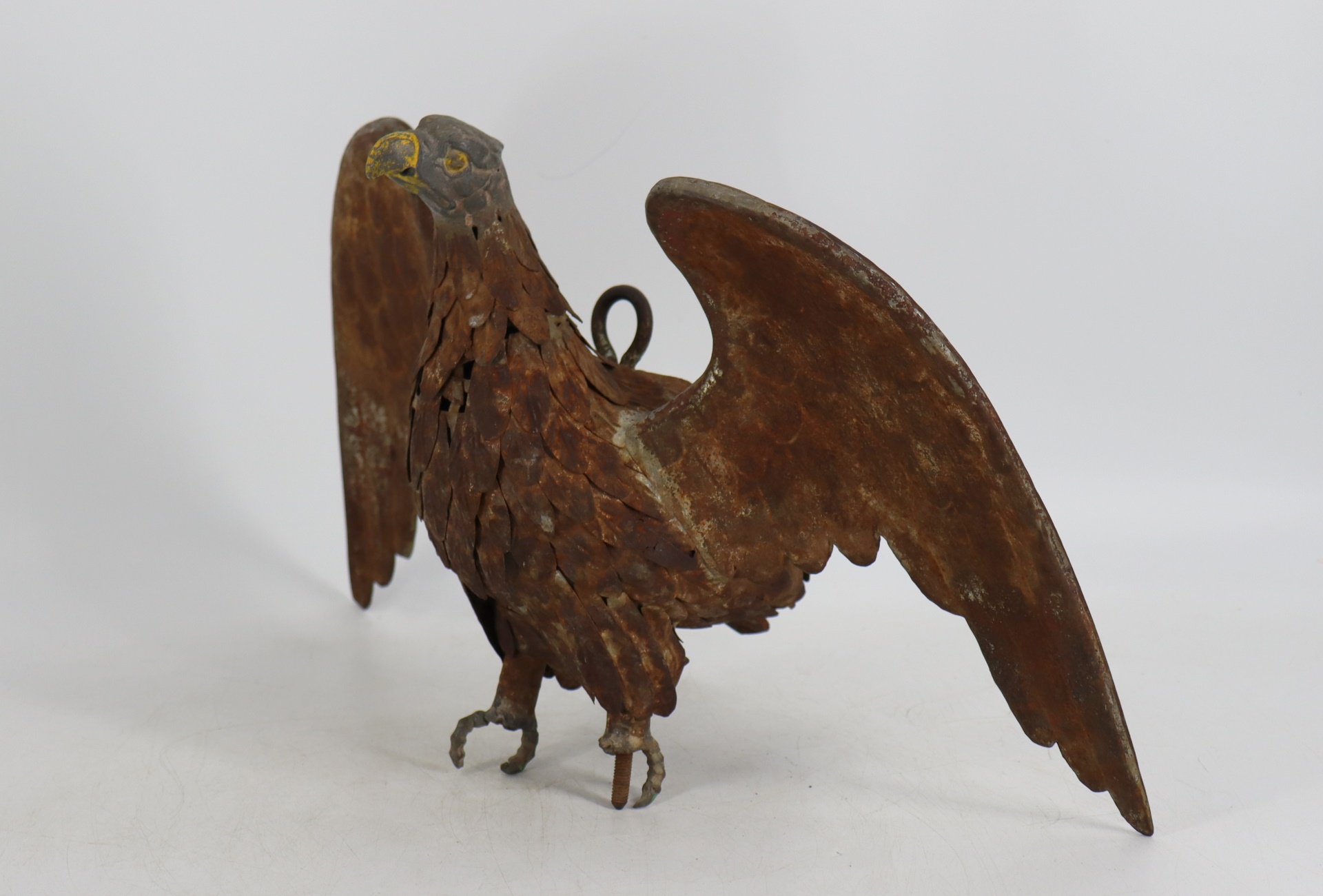 Appraisal: ANTIQUE AMERICAN METAL FOLK ART EAGLE Good size and well