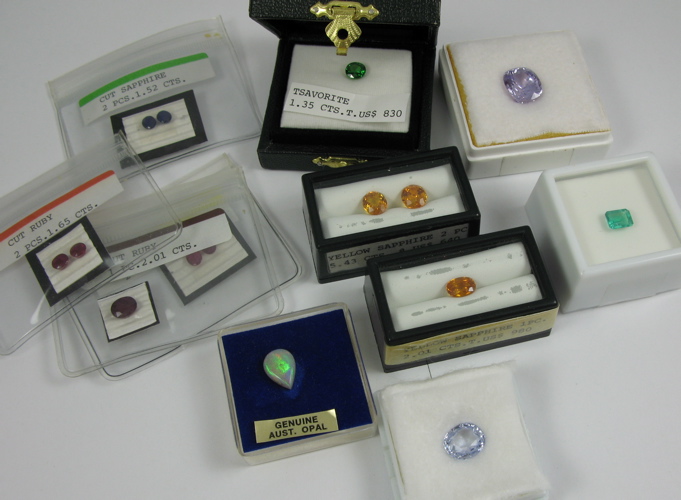 Appraisal: PARCELS OF UNSET GEMSTONES including yellow sapphires rubies spinel tsavorite