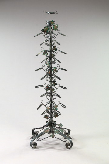 Appraisal: Elaborate Painted Wrought-Iron Twenty-One-Bottle Quatrepodal Wine Rack first quarter th