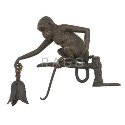 Appraisal: BRONZE MONKEY FORM LAMP Electrified with mounting bracket early th