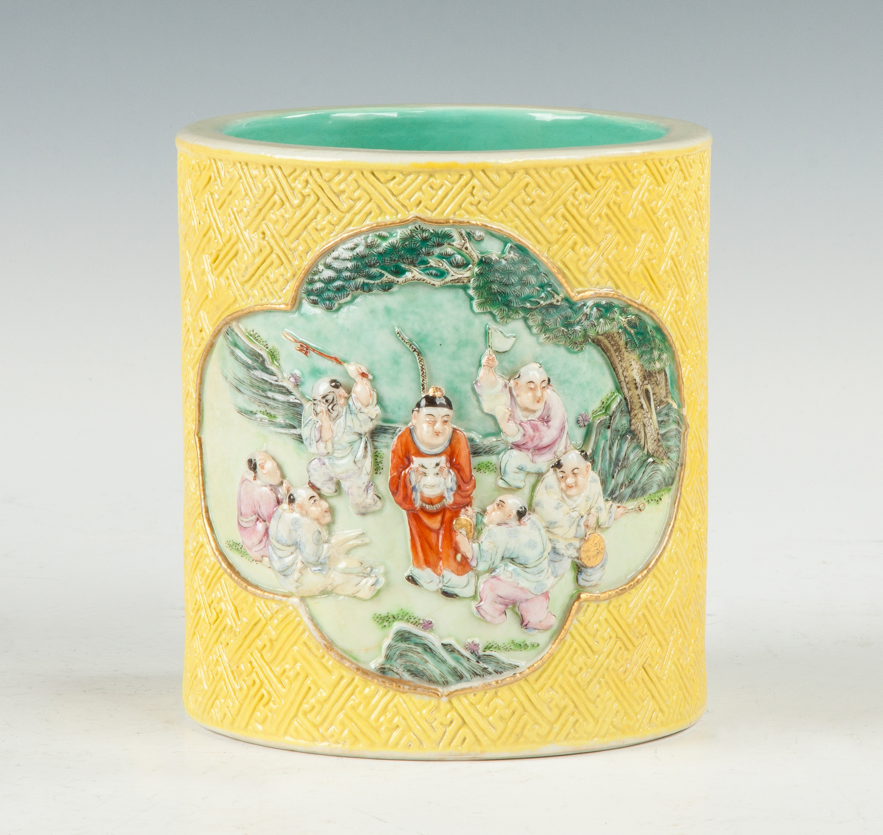 Appraisal: Chinese Porcelain Brush Pot Sgn Relief hand painted figures yellow