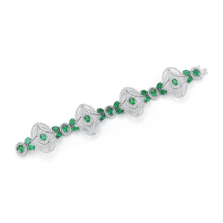 Appraisal: OVAL EMERALD BRACELET Fancy Shape OVAL Setting K W Color