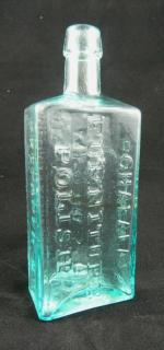 Appraisal: Furniture polish bottle Furniture polish rectangular aqua marked on panels