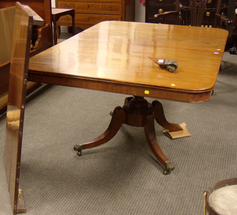 Appraisal: Regency-style Mahogany and Mahogany Veneer Pedestal-base Dining Table with one