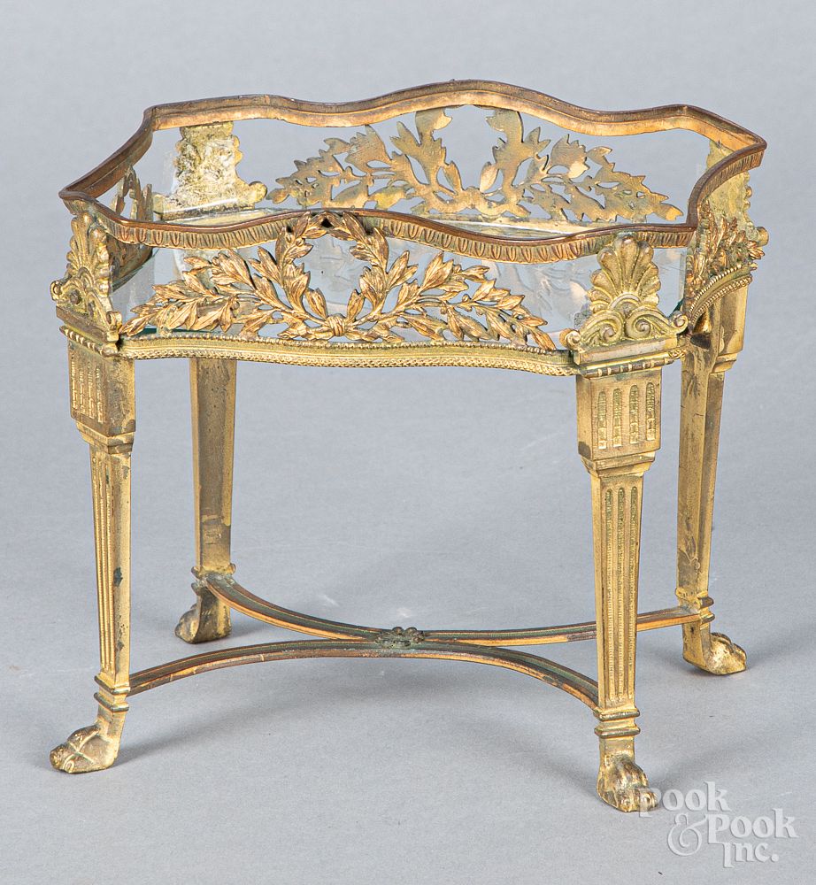 Appraisal: Cast brass dollhouse potting table Cast brass dollhouse potting table