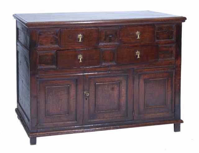 Appraisal: AN ANTIQUE OAK DRESSER with two short drawers over a