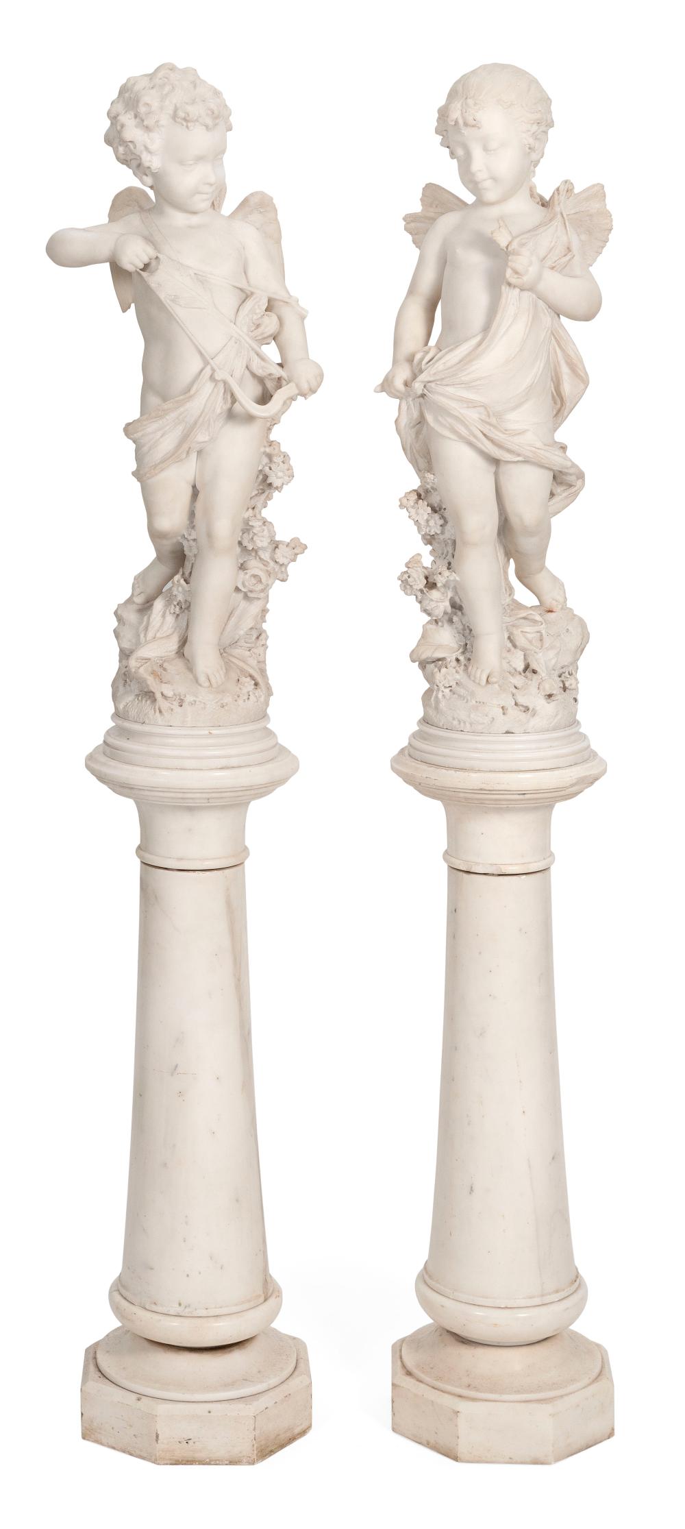 Appraisal: PAIR OF WHITE MARBLE WINGED CHERUBS LATE TH EARLY TH