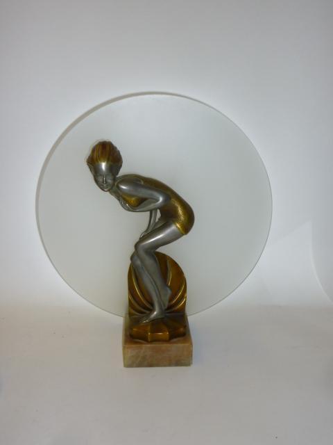 Appraisal: AN ART DECO BRONZED SPELTER FIGURAL TABLE LAMP modelled as