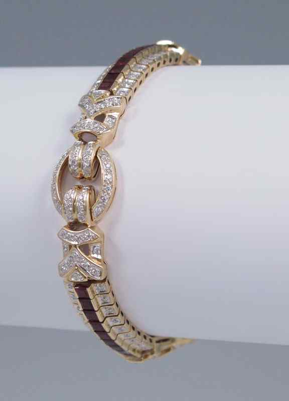 Appraisal: K GOLD RUBY AND DIAMOND BRACELET K yellow gold bracelet