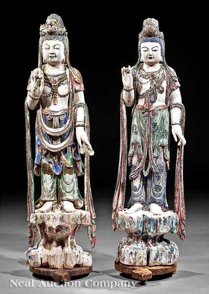 Appraisal: Two Chinese Polychrome Painted Carved Wood Figures of Guanyin each